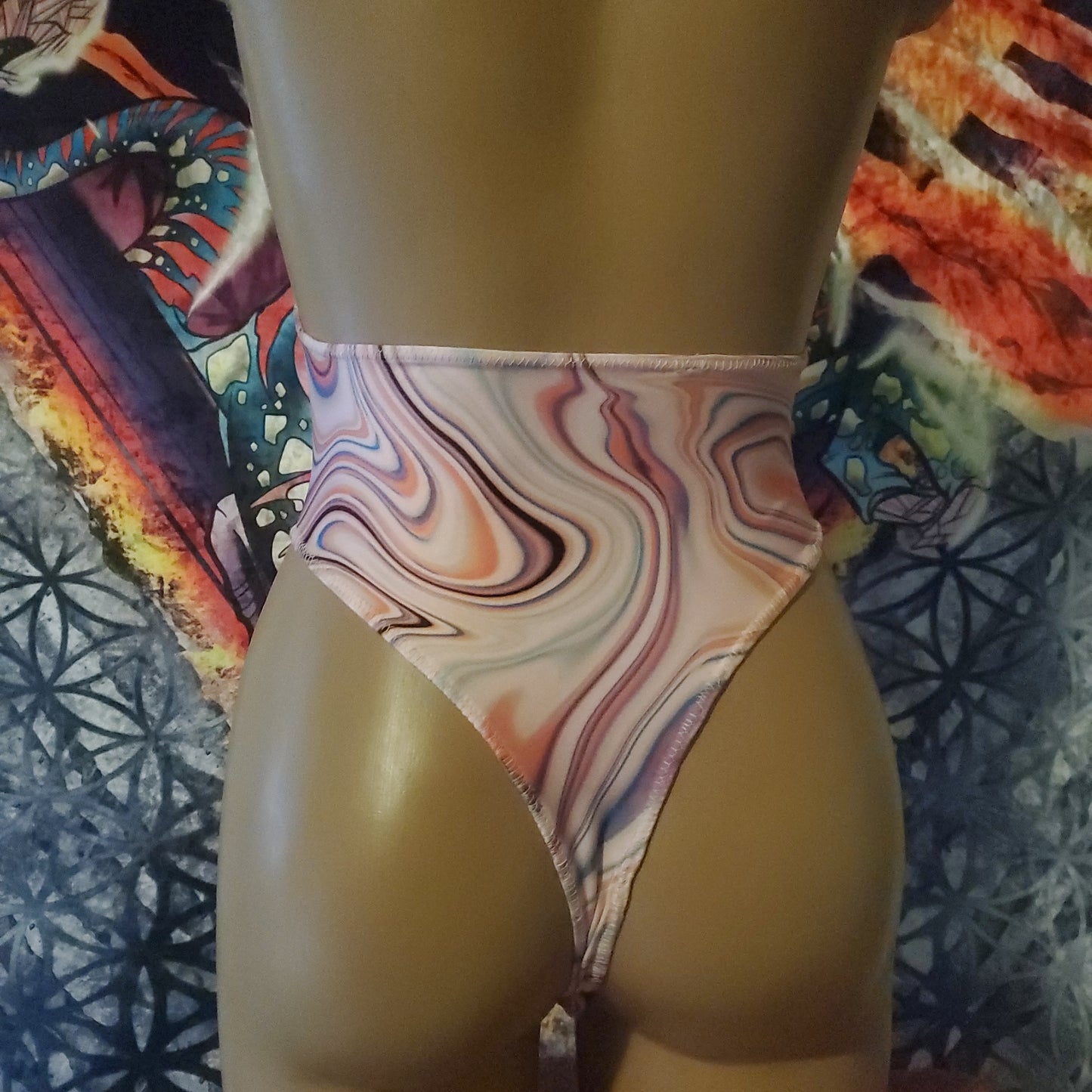 Pink swirls on Virgo Bodysuit